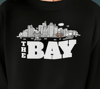 Black shirt with 'The Bay' cityscape graphic on a dark background, cable car